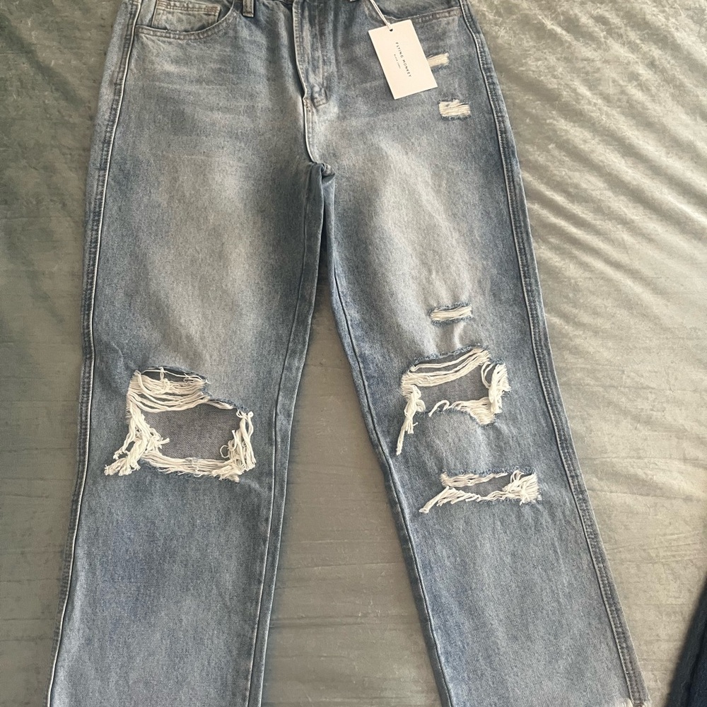 Distressed Blue Jeans